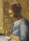 Woman in Blue reading a Letter