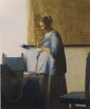 Woman in Blue reading a Letter